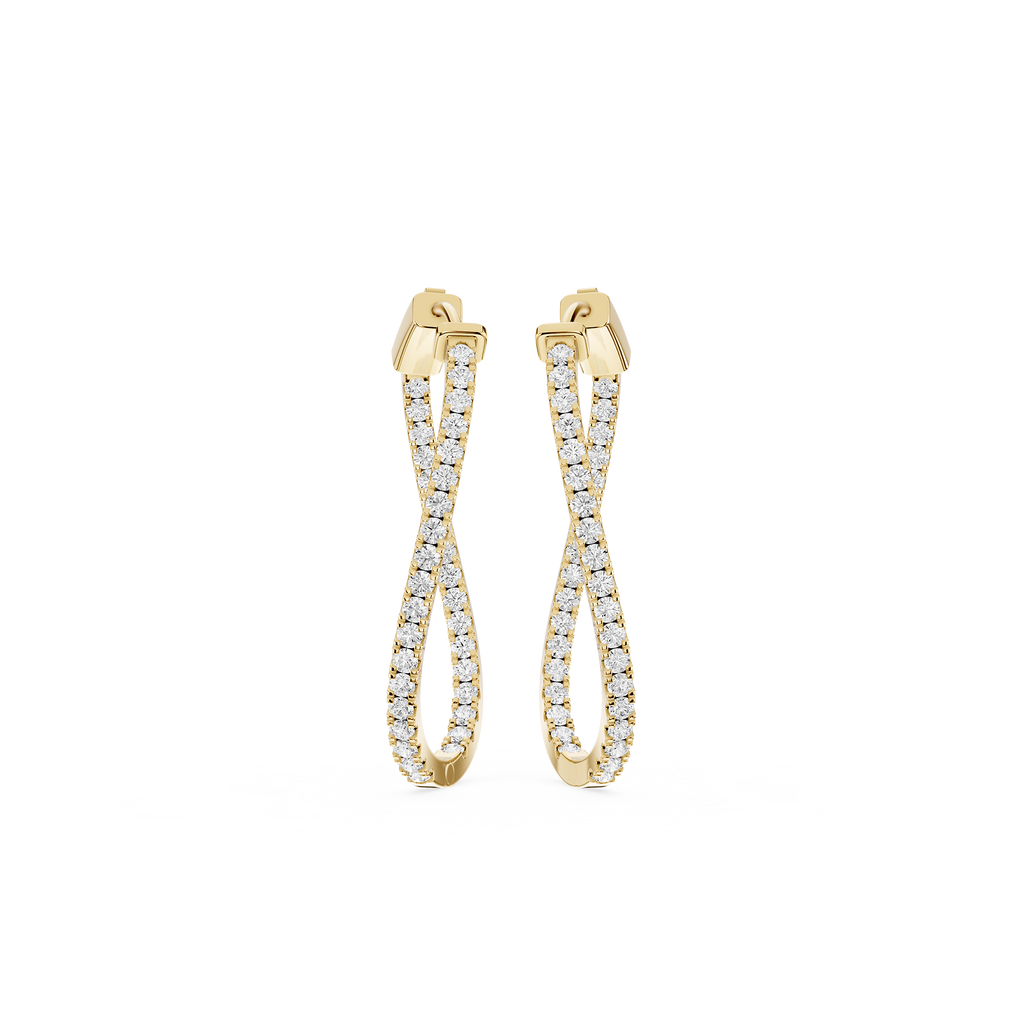 Gold earrings with diamond accents on a white background