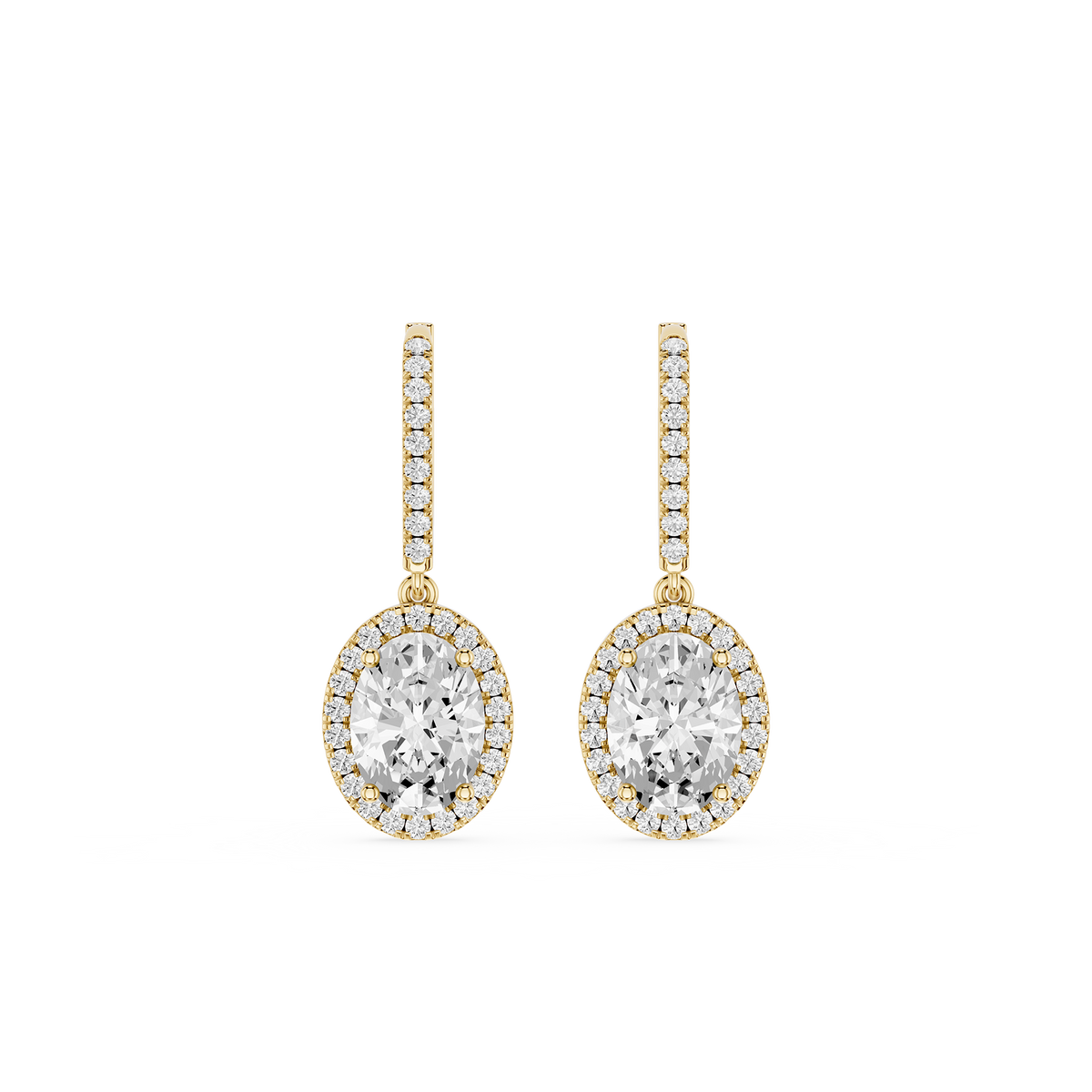 Gold and diamond earrings on a white background