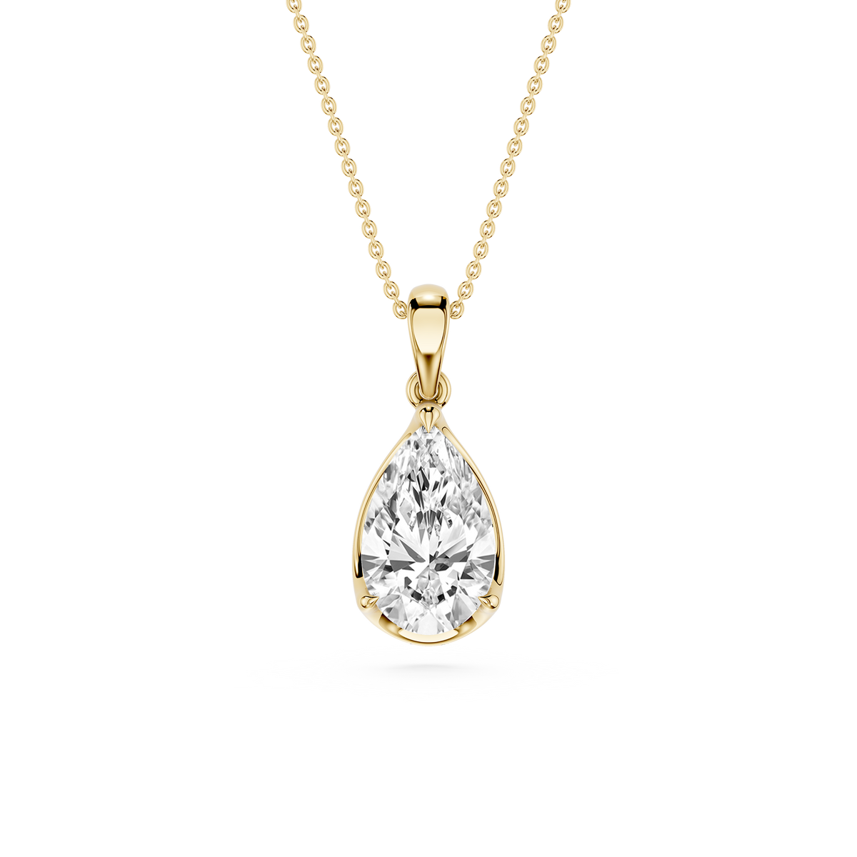 Gold necklace with a teardrop-shaped diamond pendant on a white background