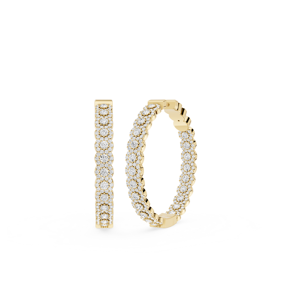 Gold hoop earrings with diamond accents on a white background