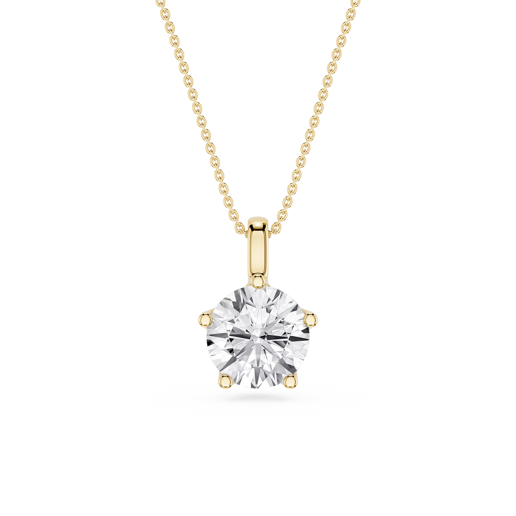 Gold necklace with a round diamond pendant on a white background