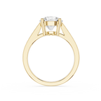 A yellow gold solitaire engagement ring with a round brilliant-cut diamond center stone, shown on a clean white background.