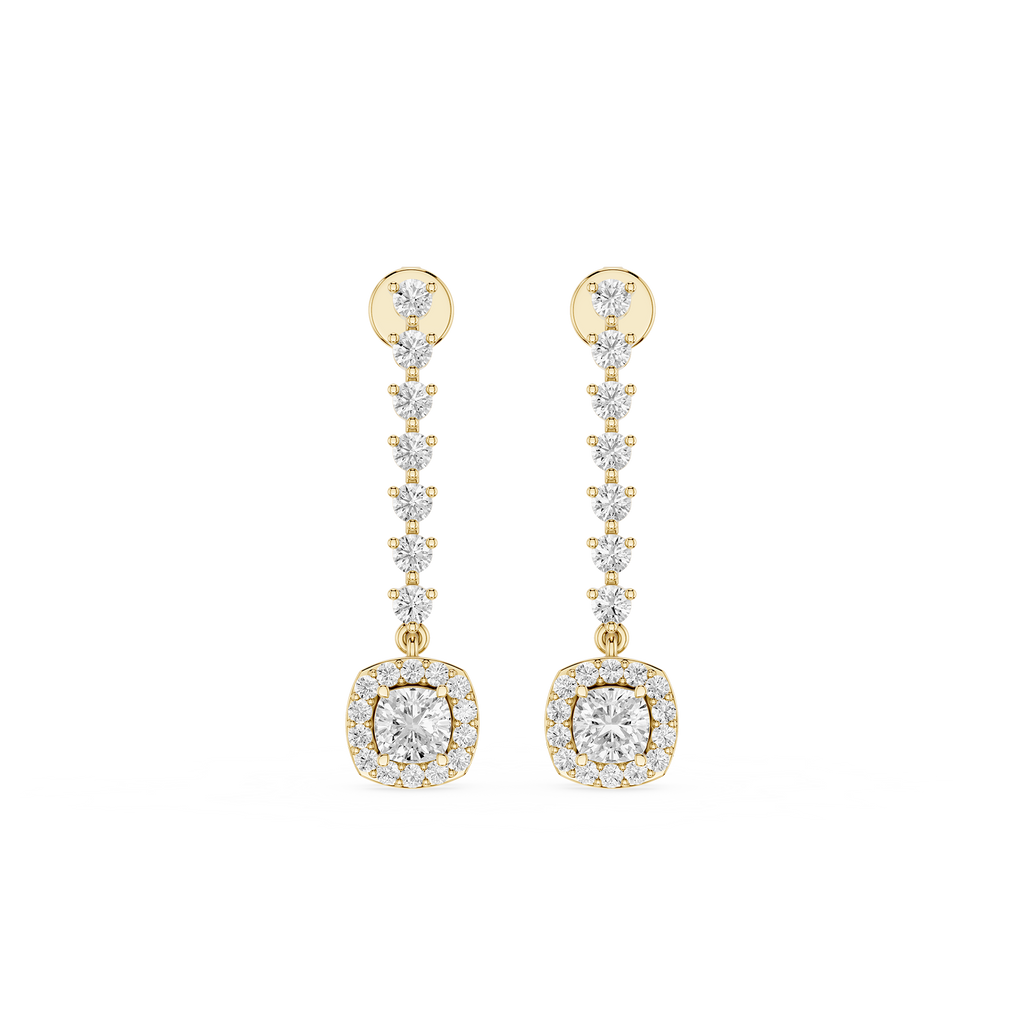 Gold and diamond earrings on a white background