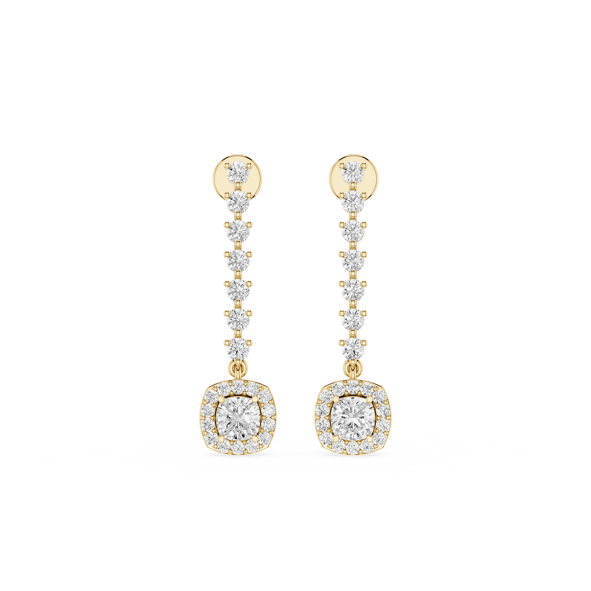 Gold and diamond earrings on a white background