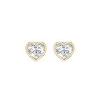Heart-shaped diamond earrings with gold settings on a white background