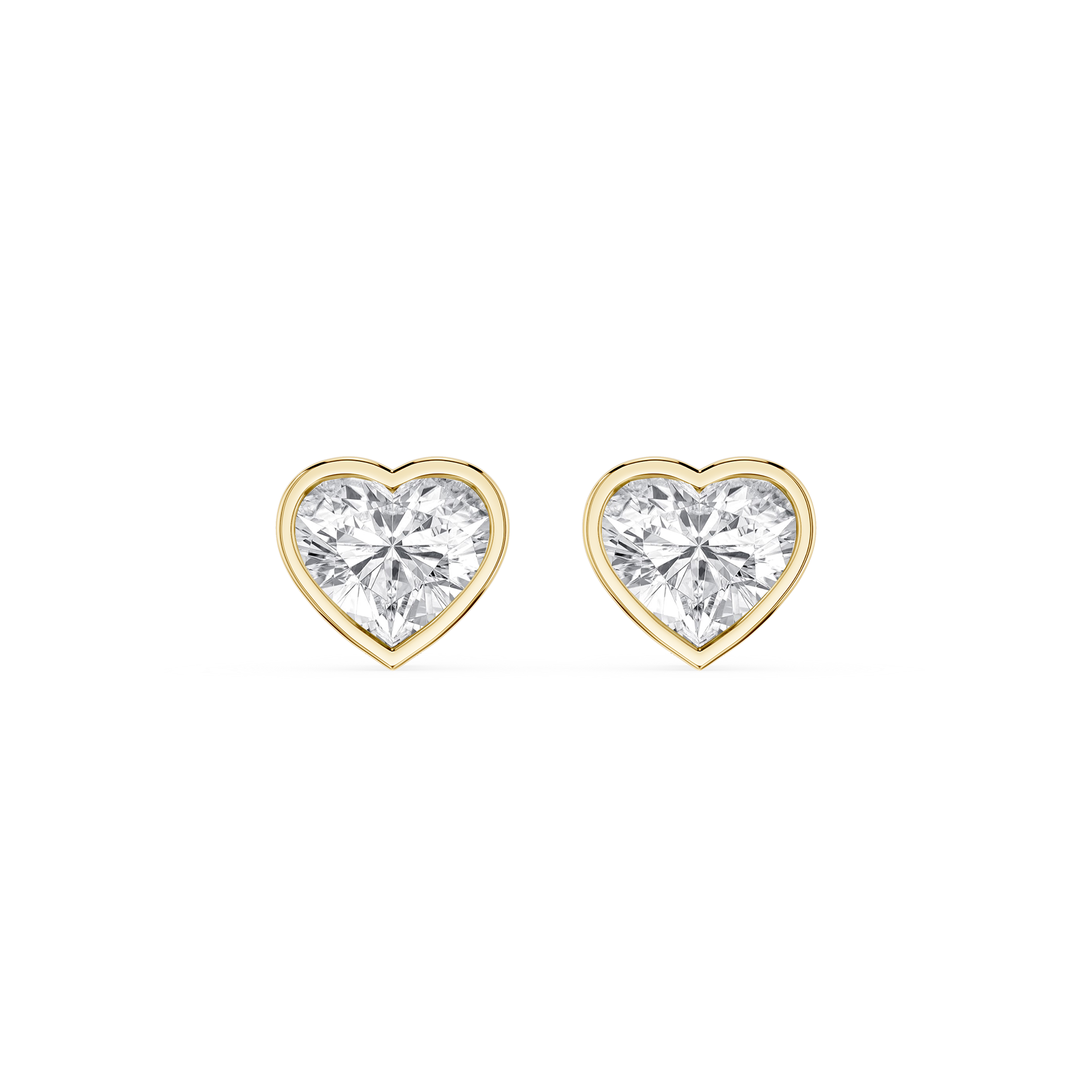 Heart-shaped diamond earrings with gold settings on a white background