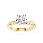 Gold ring with a diamond on a white background