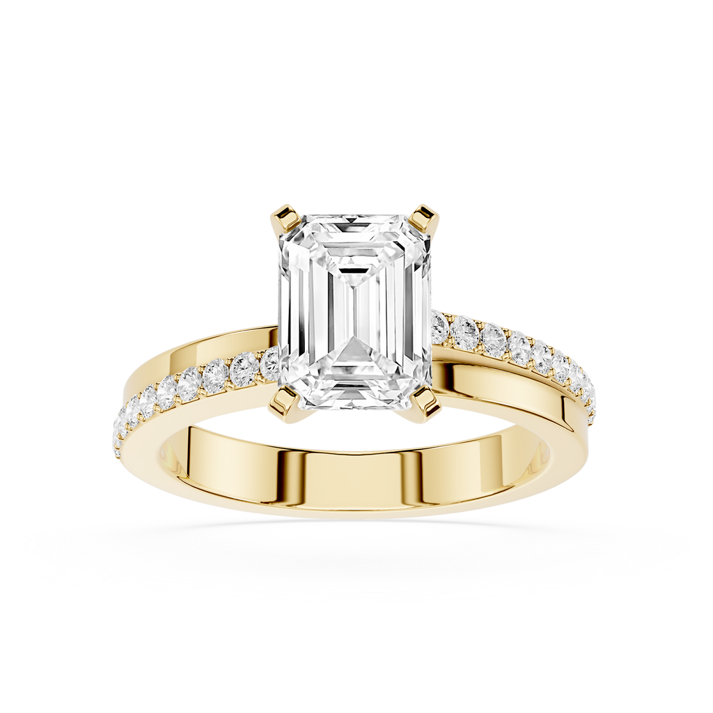 Gold ring with emerald-cut diamond and smaller diamonds on a white background