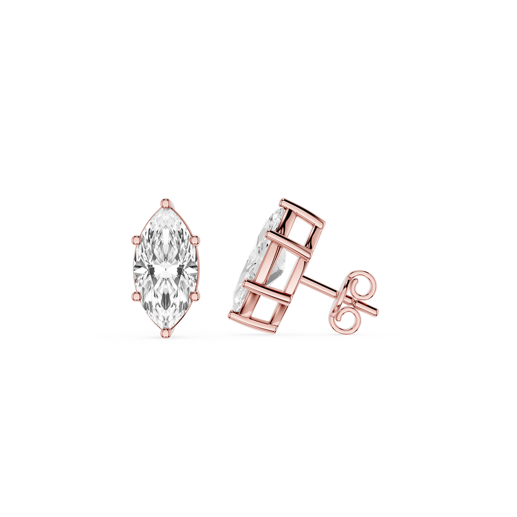 Rose gold earrings with clear gemstones on a white background
