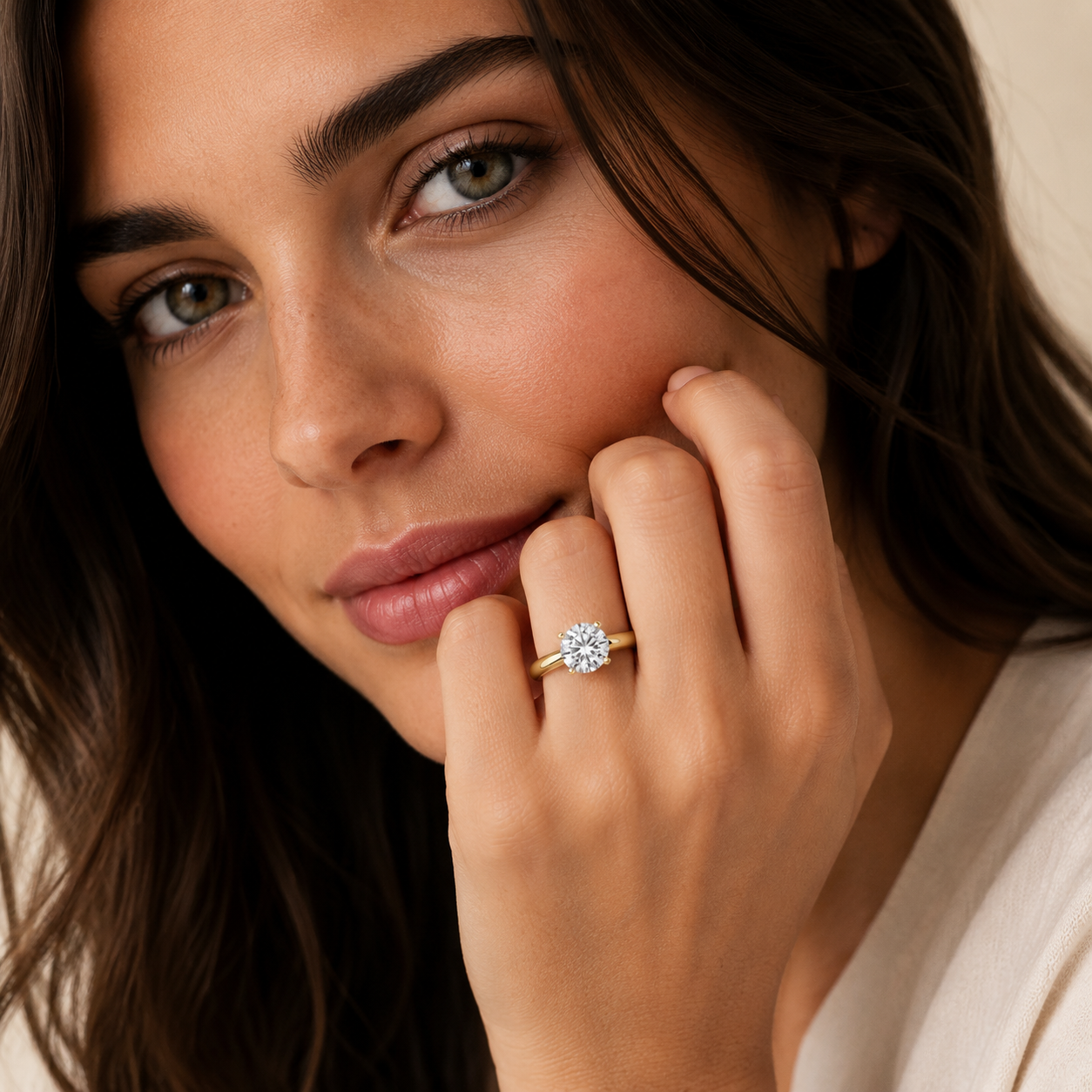 Close-up of a woman wearing a diamond ring on her finger