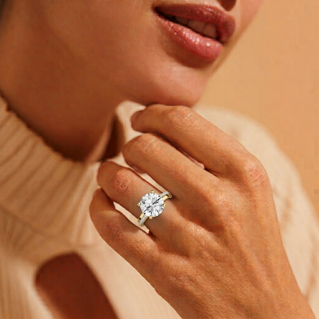 Close-up of a hand wearing a diamond ring with a soft focus background