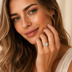Woman wearing a diamond ring with a soft focus background