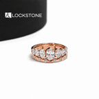 Rose gold five stone oval lab grown diamond anniversary ring paired with a round bezel set diamond wedding band