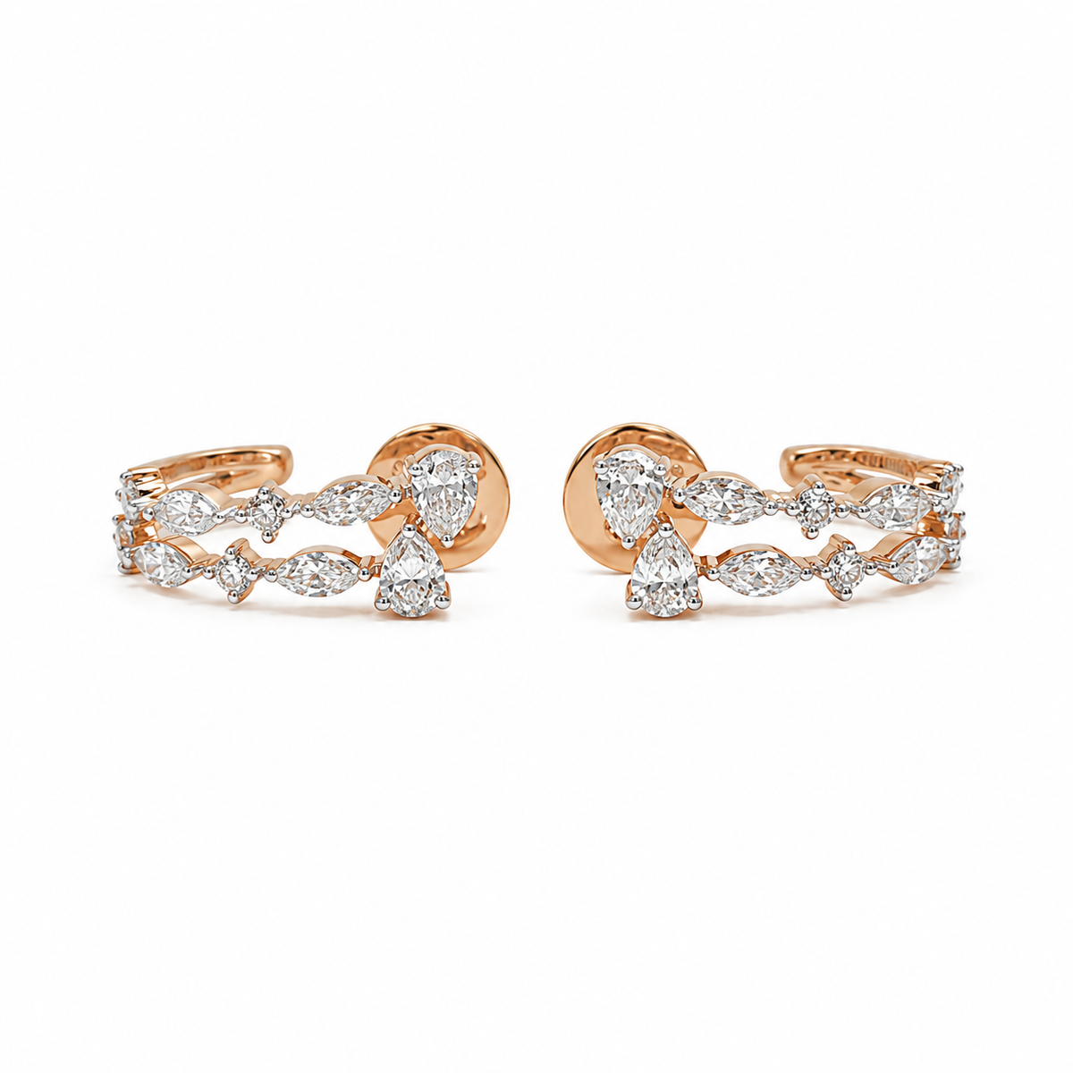 Alternating marquise and round diamonds line two curved strands on these rose gold open hoop earrings