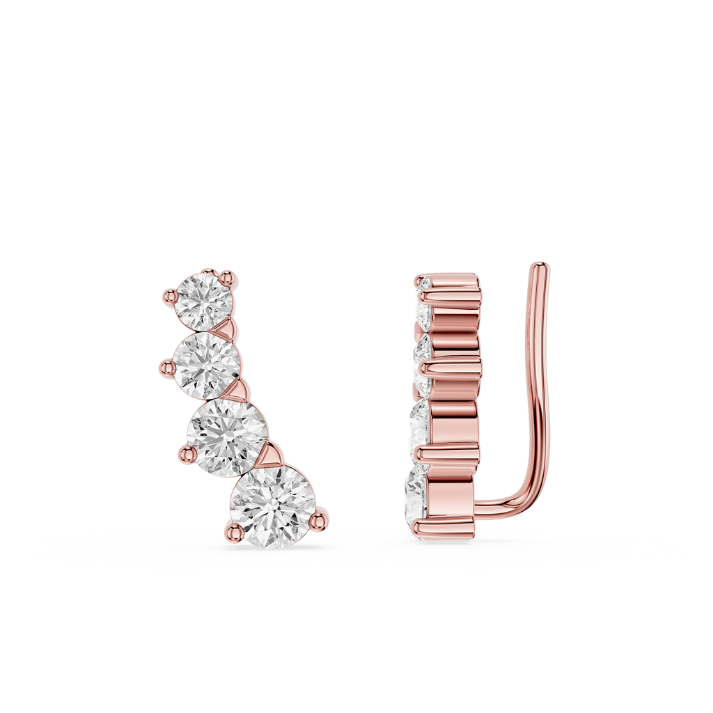 Rose gold earrings with clear gemstones on a white background
