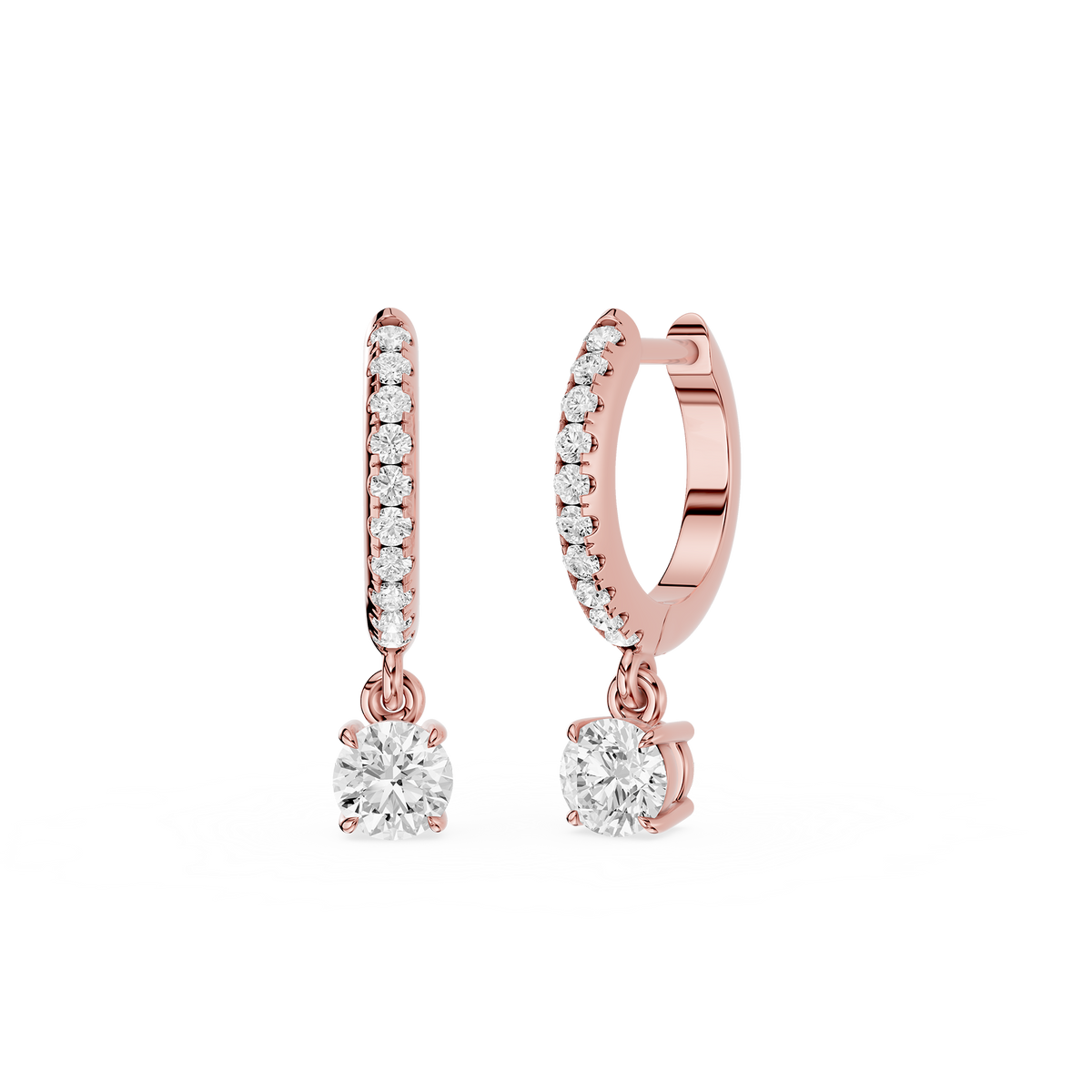 Rose gold hoop earrings with round gemstones on a white background
