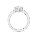 Silver ring with a diamond on a white background