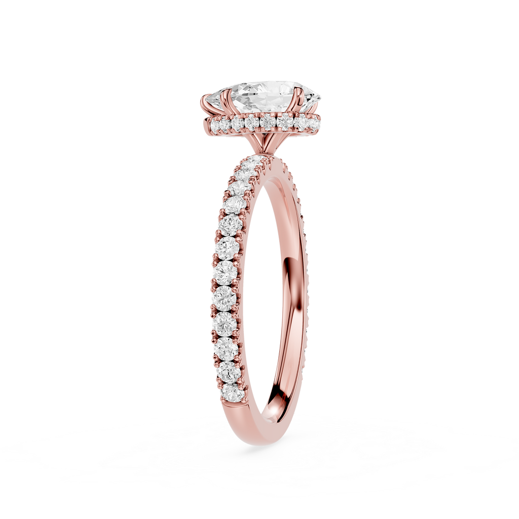 Rose gold diamond ring on a white background