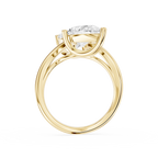 Back view Of Pear diamond two stone engagement ring in yellow gold showcasing prong set diamonds and a curved crossover band