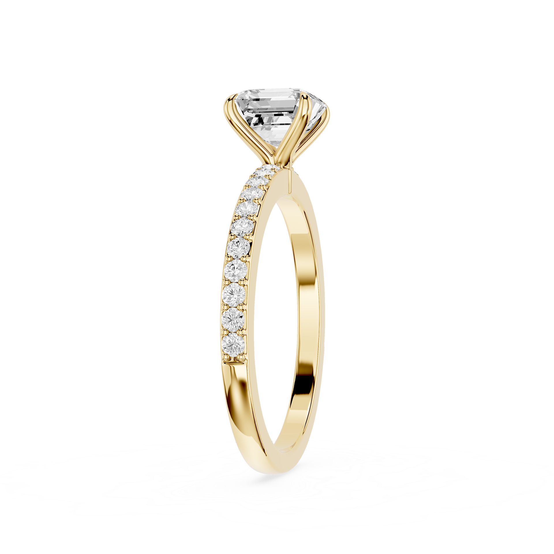 Emerald-cut lab-grown diamond pavé solitaire engagement ring in yellow gold.