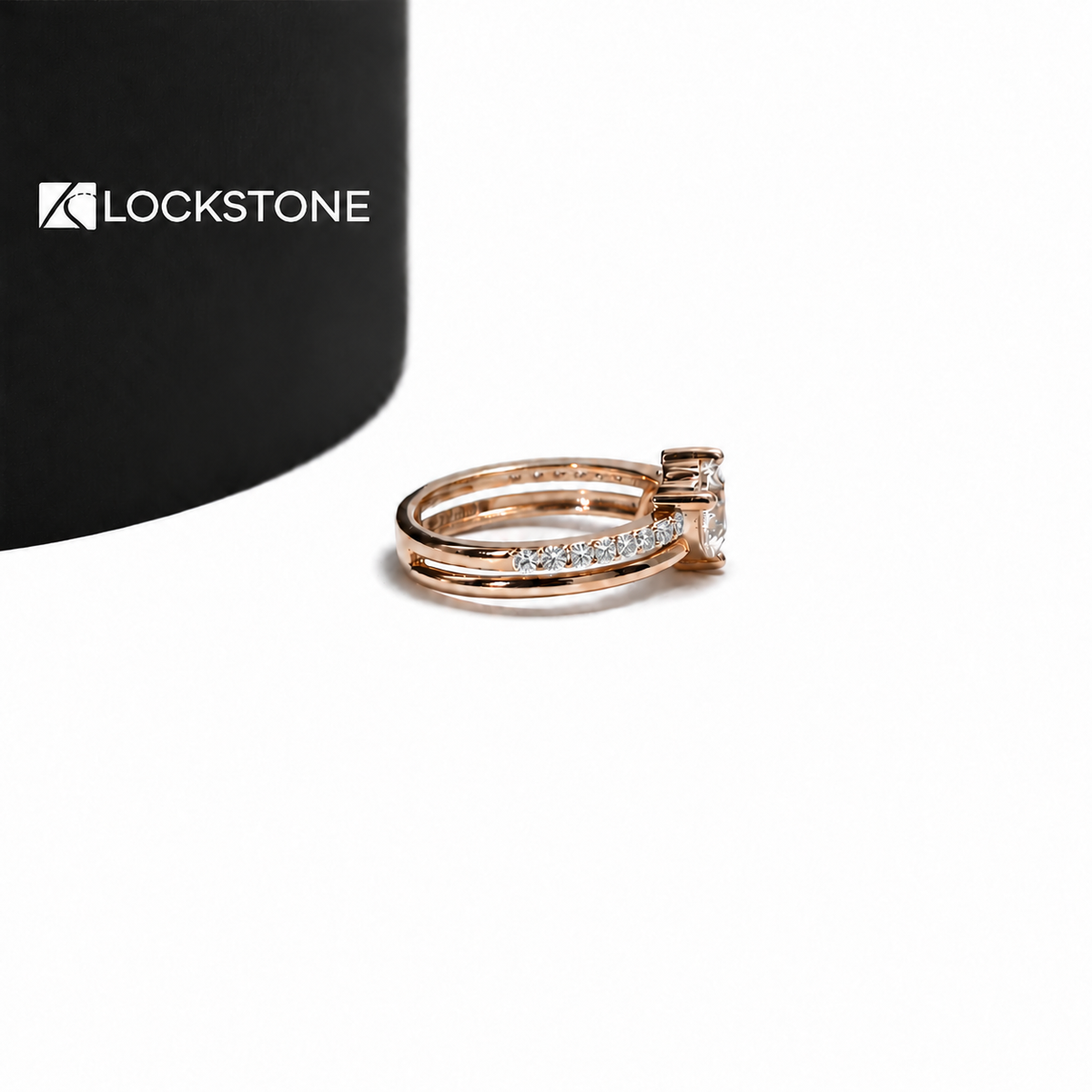 Lockstone Jewels rose gold double heart diamond bridal set featuring an asymmetric two stone design and matching pavé band