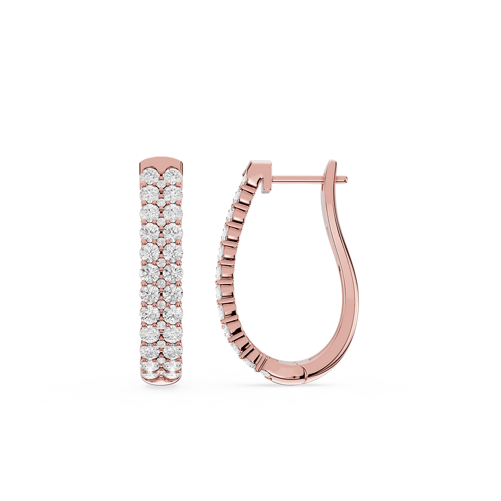 Rose gold hoop earrings with clear gemstones on a white background