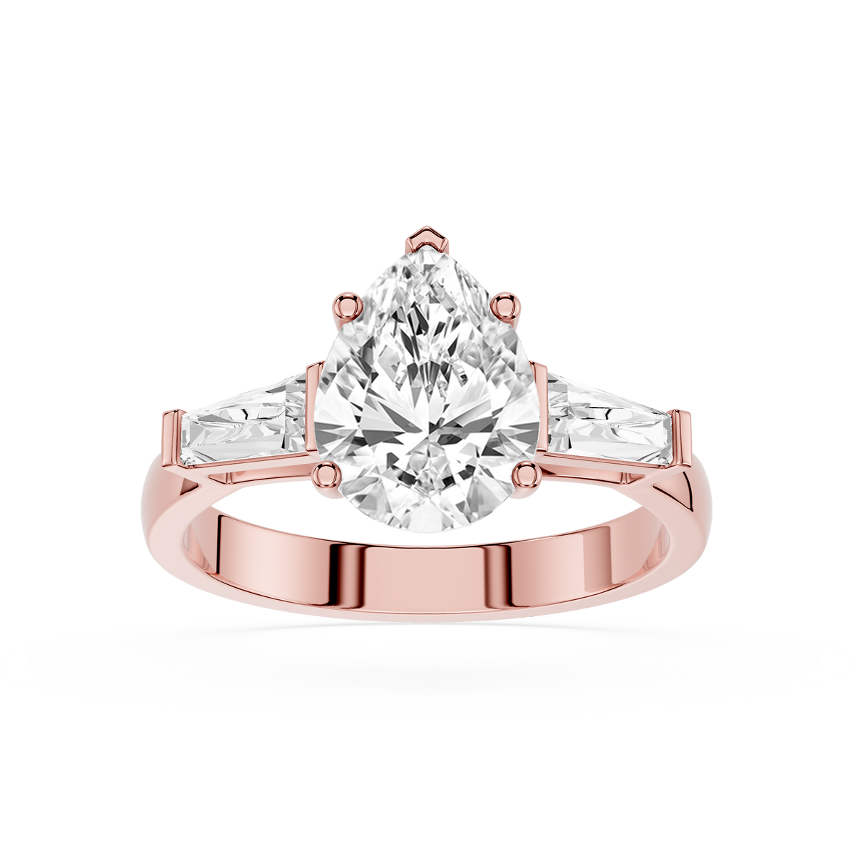 Three Stone Pear Shaped Diamond Engagement Ring in Rose Gold showcasing a polished band, pear cut center diamond, and baguette accent stones.