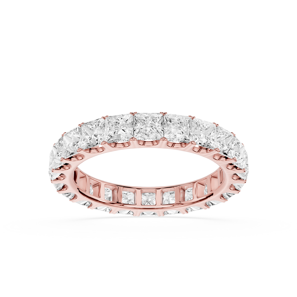 Rose gold eternity wedding ring adorned with princess cut lab grown diamonds, combining modern geometry with a warm metal finish.
