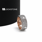 Multi row pavé diamond cocktail ring in rose gold showcasing mixed cut diamonds and decorative openwork inside the band