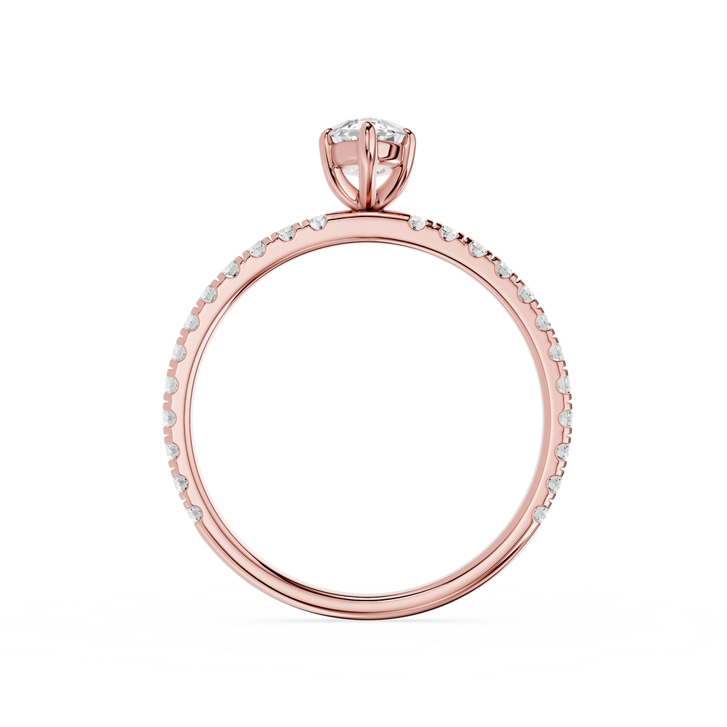 Rose gold ring with diamonds on a white background