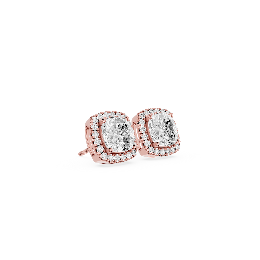 Rose gold earrings with clear gemstones on a white background