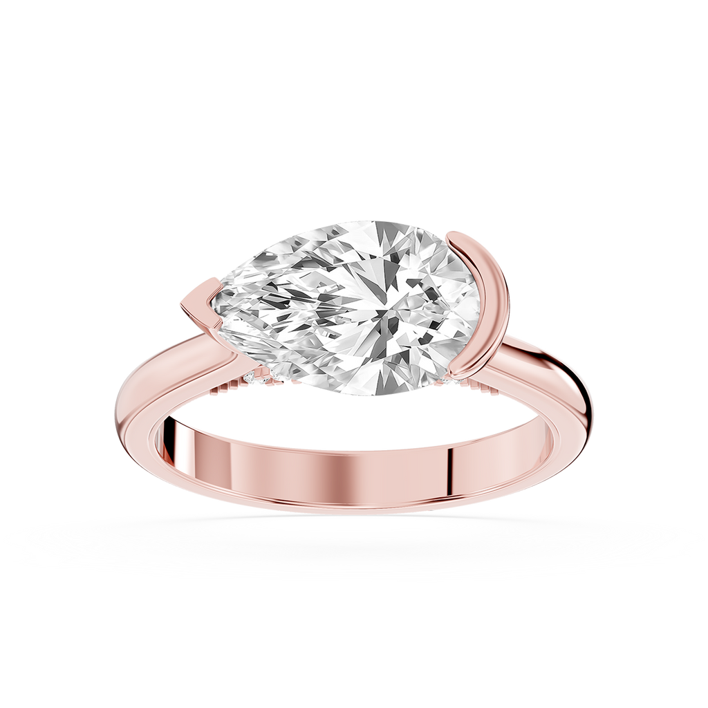 Rose gold east west pear cut lab grown diamond ring showcasing a horizontal solitaire stone and partial bezel setting
