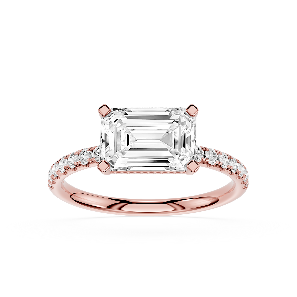 Rose gold solitaire ring featuring emerald cut lab diamond and side diamonds