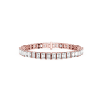 Rose gold bracelet with emerald-cut diamonds on a white background
