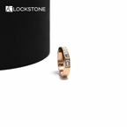 Geometric rose gold diamond statement ring showcasing flush set rectangular step cut stones and beveled metal edges