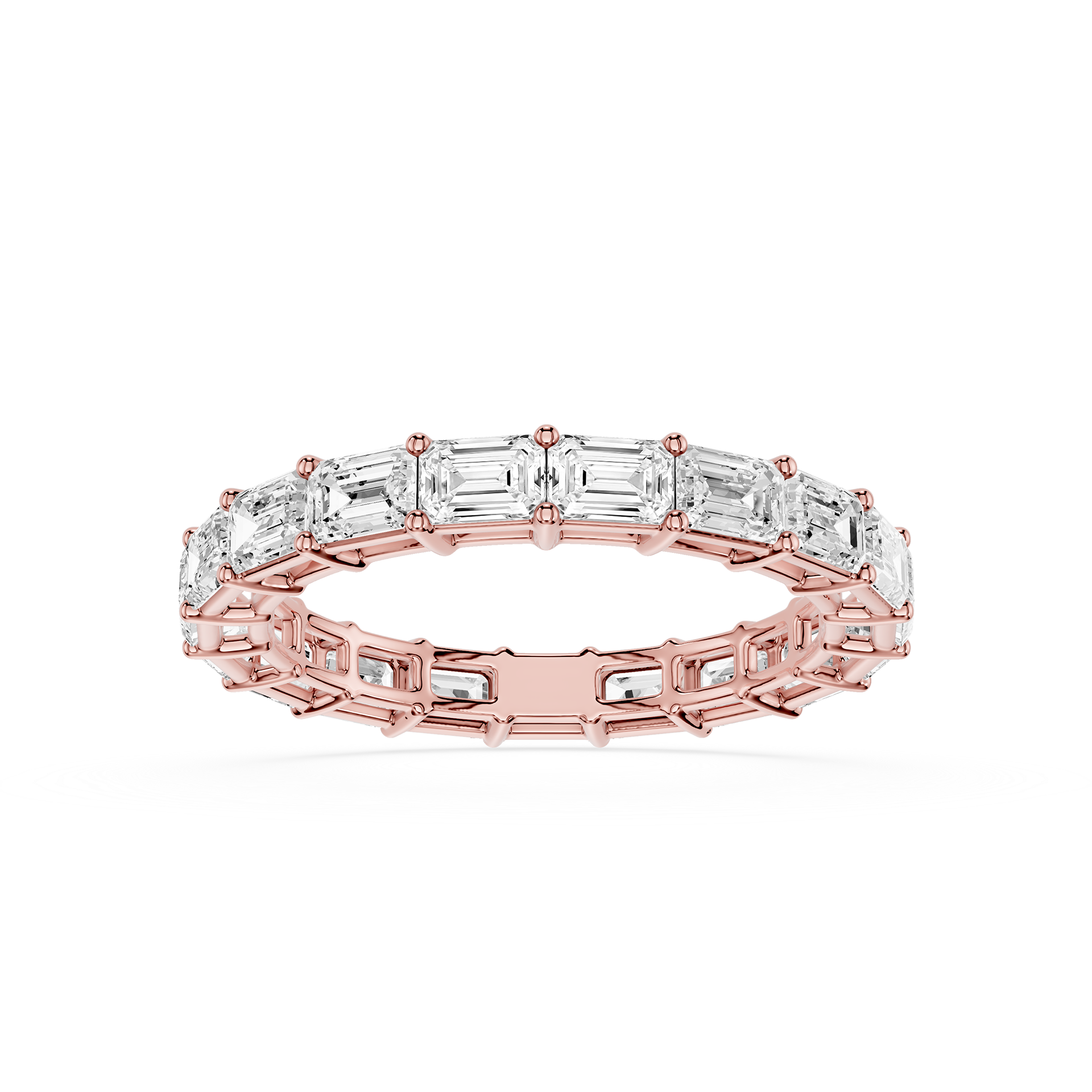 A rose gold eternity ring featuring a continuous line of baguette-cut clear gemstones, shown on a clean white background.
