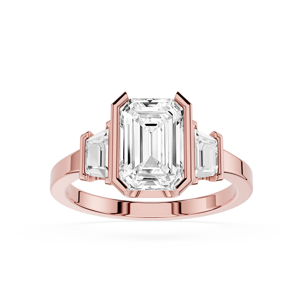 Rose gold ring with emerald-cut diamond on a white background