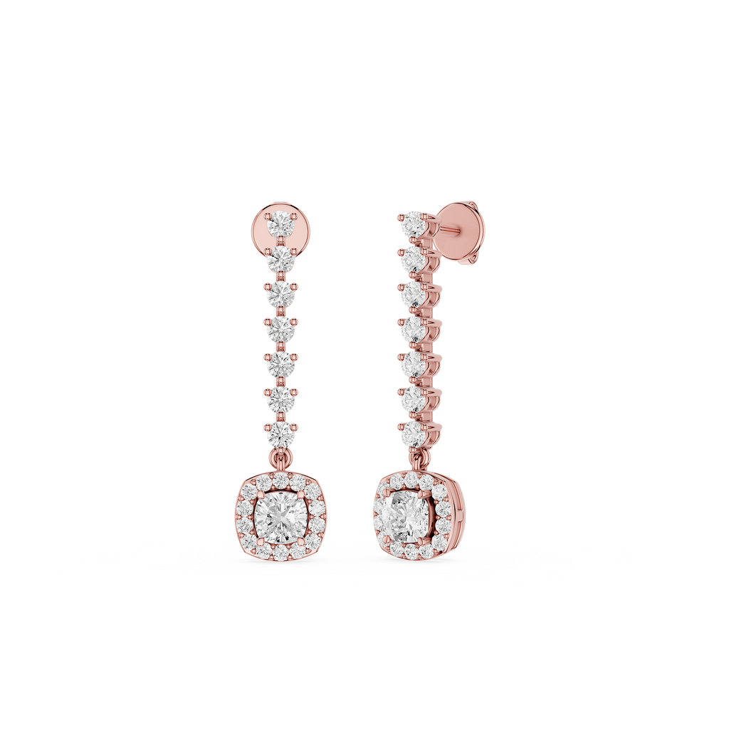 Rose gold earrings with diamond accents on a white background