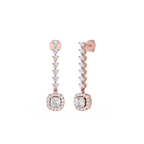 Rose gold earrings with diamond accents on a white background