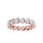 Rose gold ring with heart-shaped diamonds on a white background