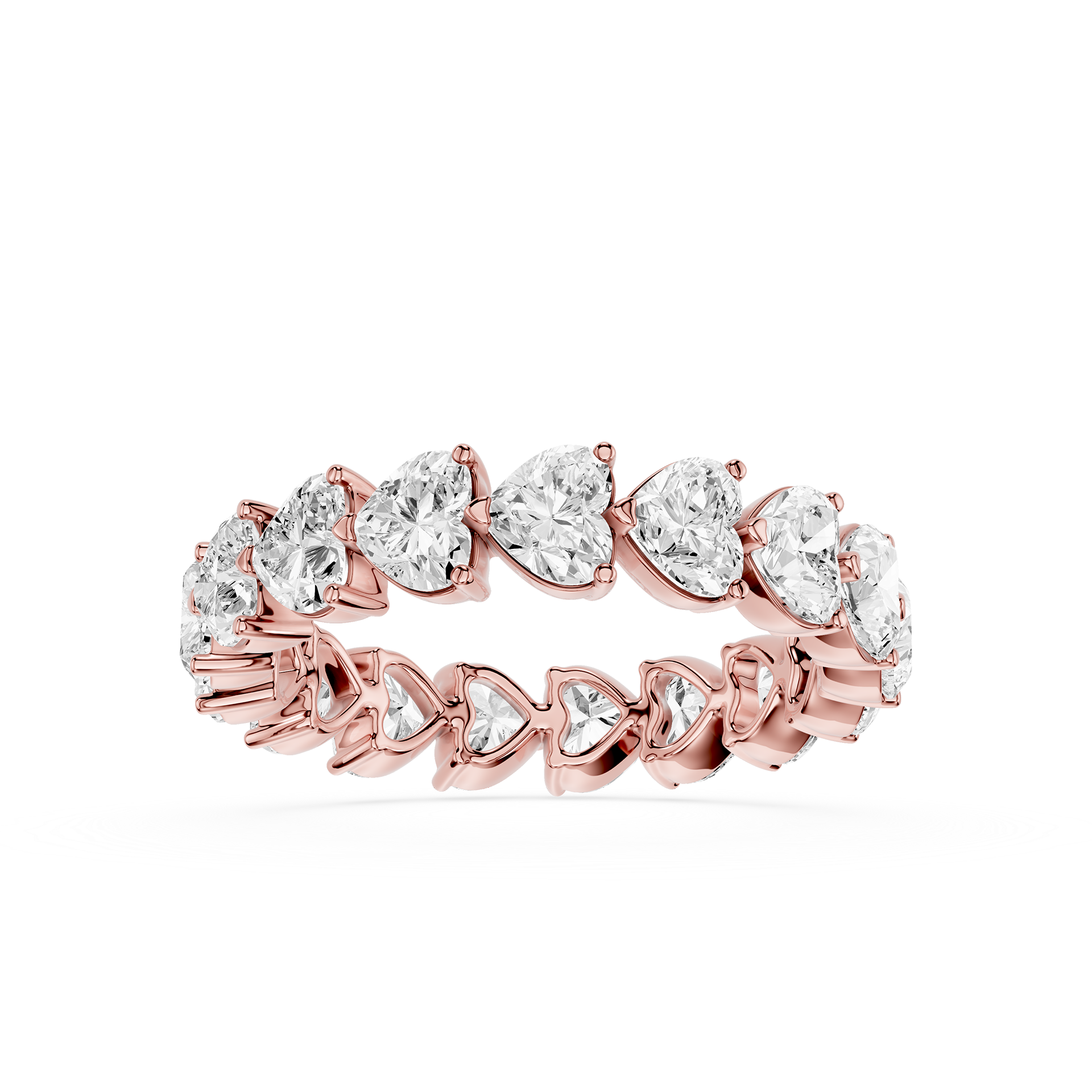 Rose gold ring with heart-shaped diamonds on a white background