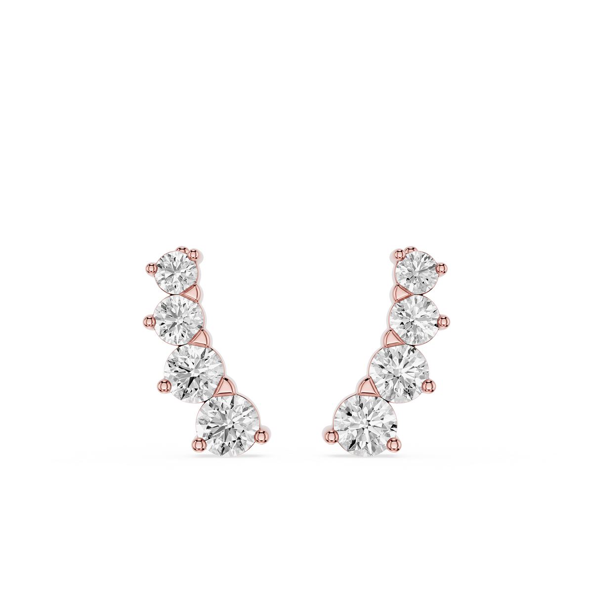 Rose gold and silver earrings on a white background