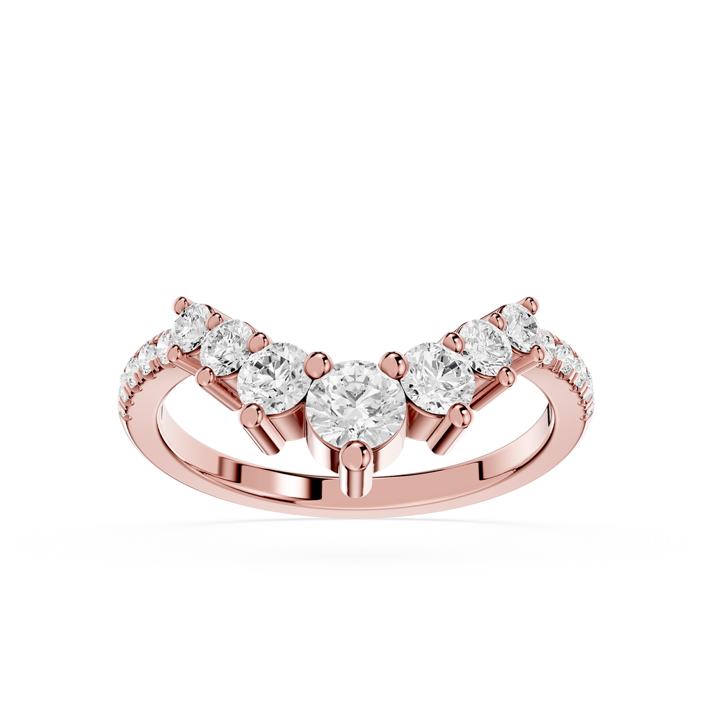 Rose gold ring with clear gemstones on a white background