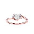 Rose gold ring with a heart-shaped diamond on a white background