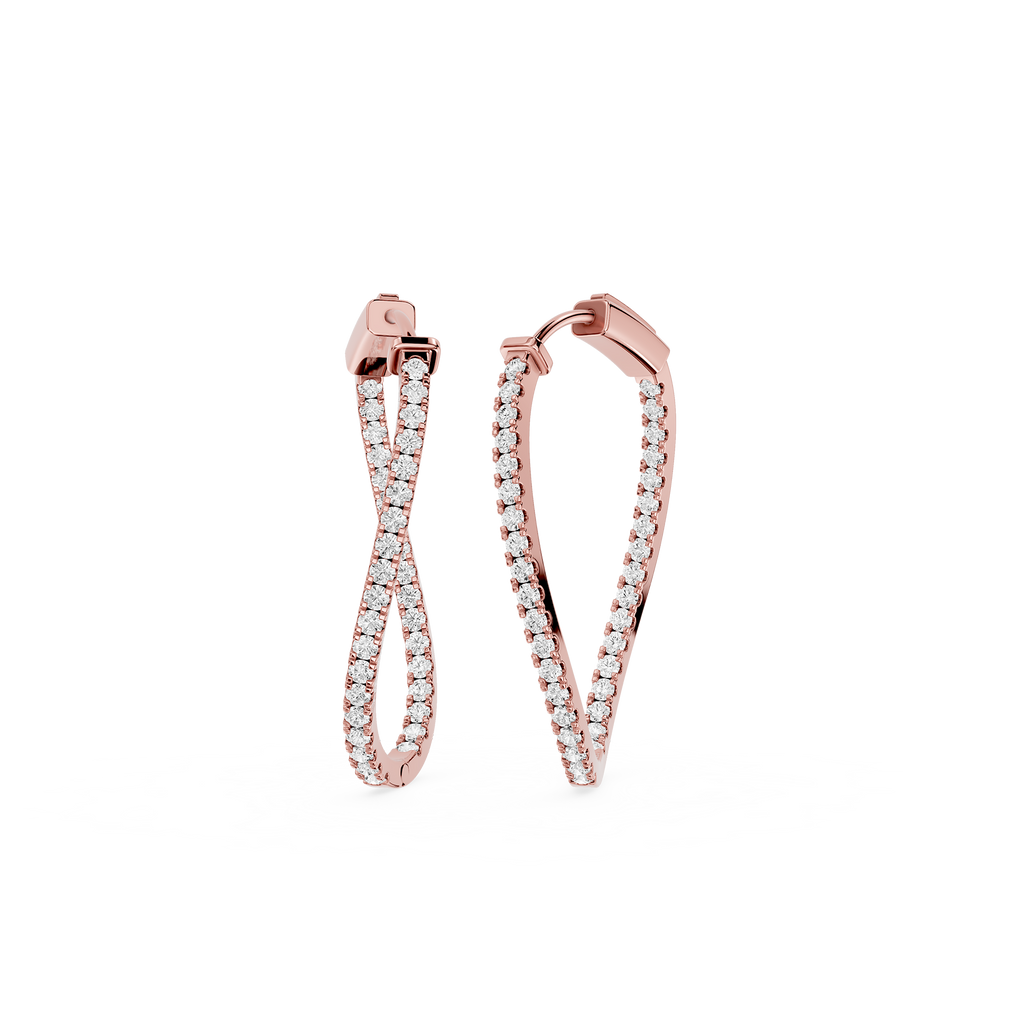 Rose gold hoop earrings with clear gemstones on a white background