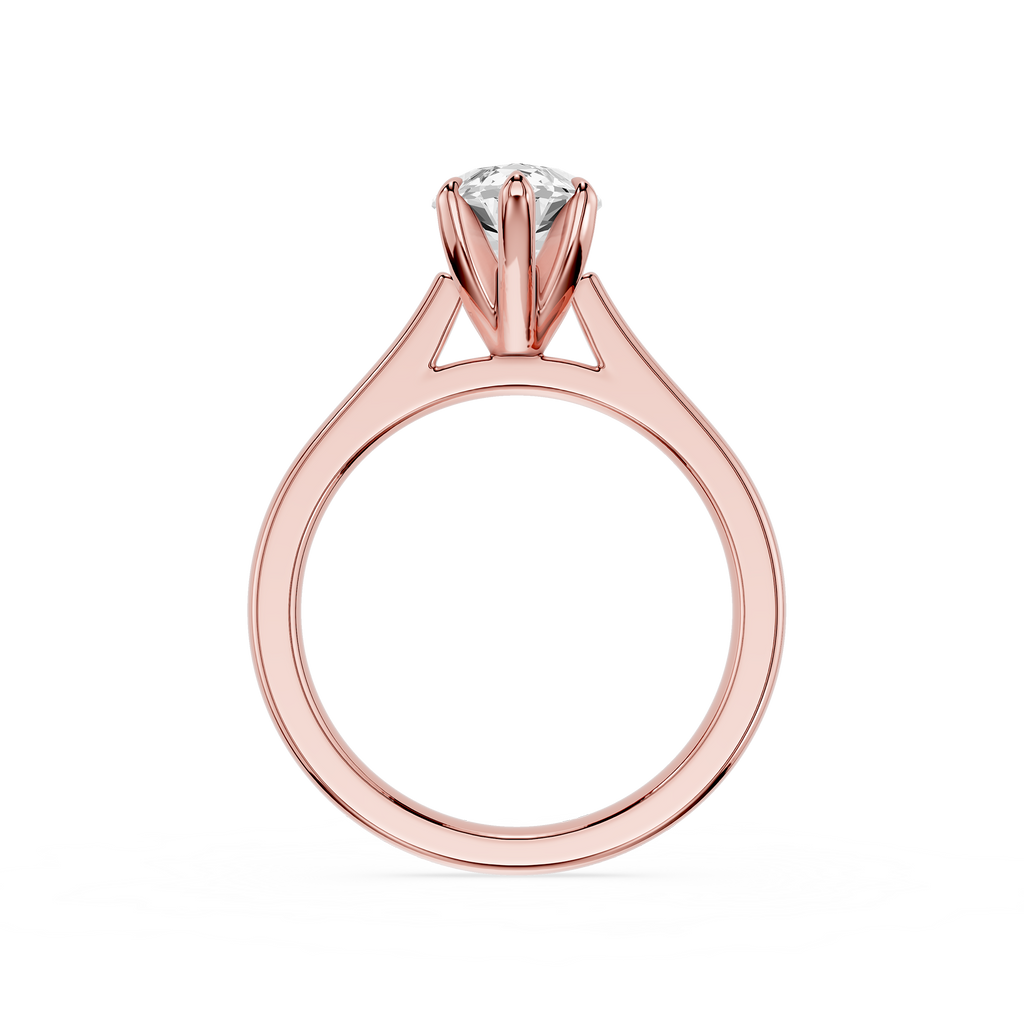 Rose gold ring with a diamond on a white background