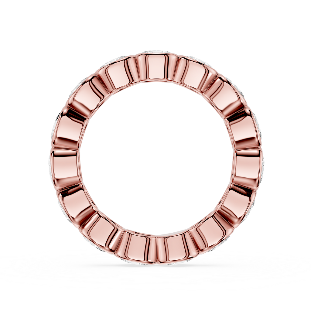 A rose gold ring with a textured, segmented outer edge and a smooth inner band, shown on a clean white background.