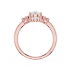 Rose gold ring with a diamond on a white background