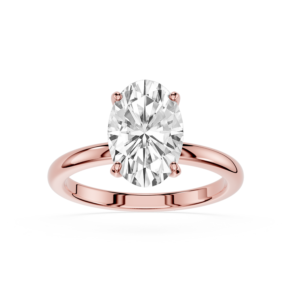 Rose gold ring with a large diamond on a white background