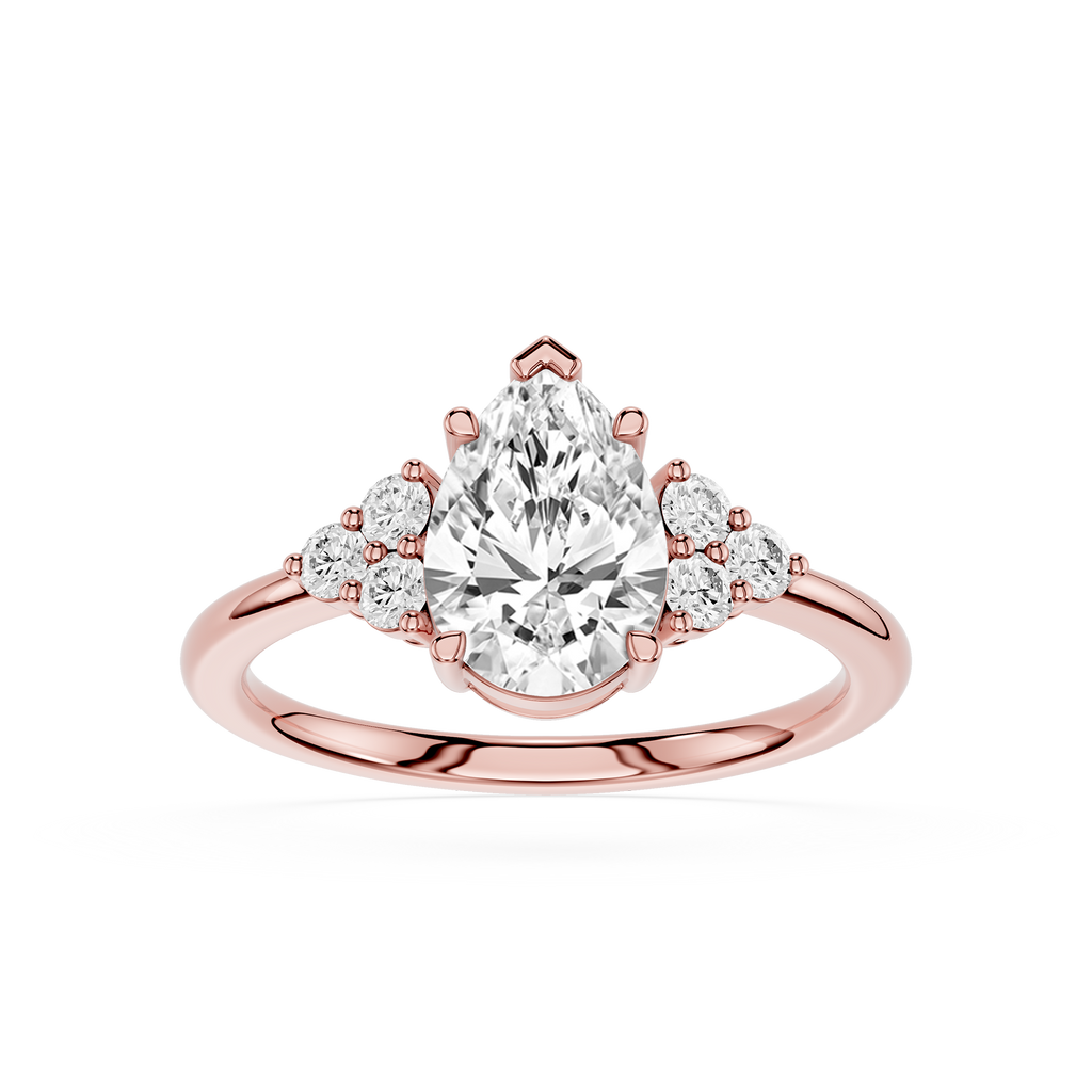 Rose gold ring with a pear-shaped diamond and smaller diamonds on a white background